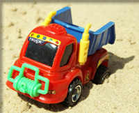 Toy truck in the sand