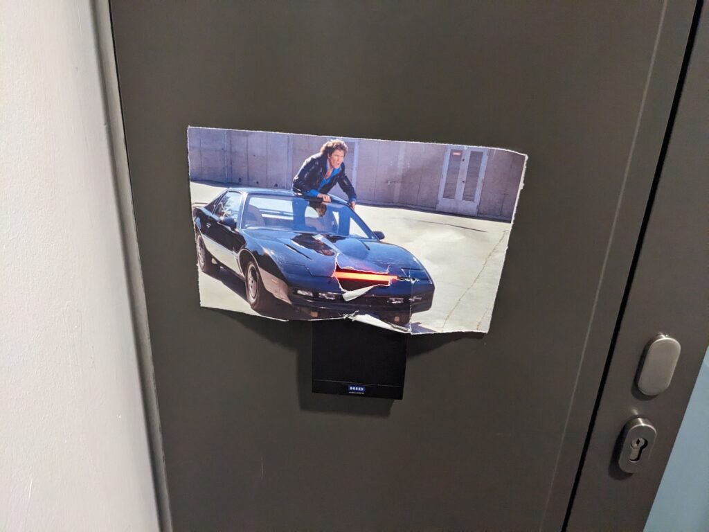 Office entry swipe bar with overlaid picture of Knight Rider