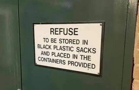 Sign stating Refuse to be stored in plastic sacks and placed in the containers provided